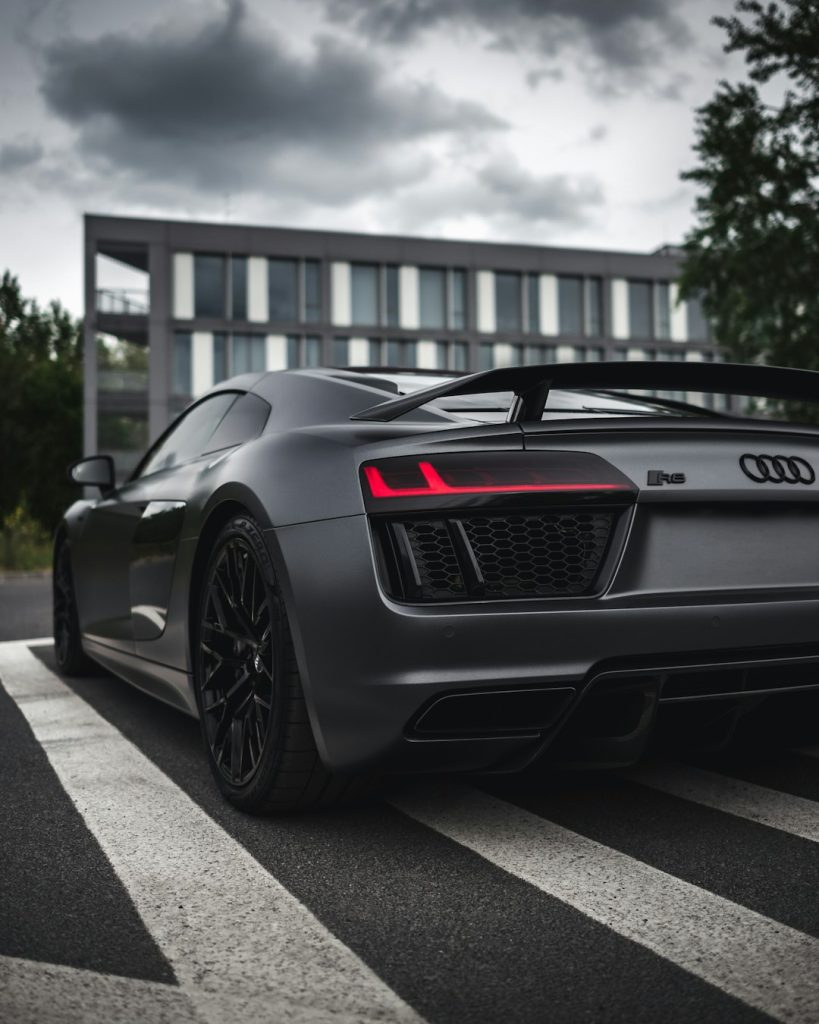 matte-grey-sports-car-parked-io29abht1-4